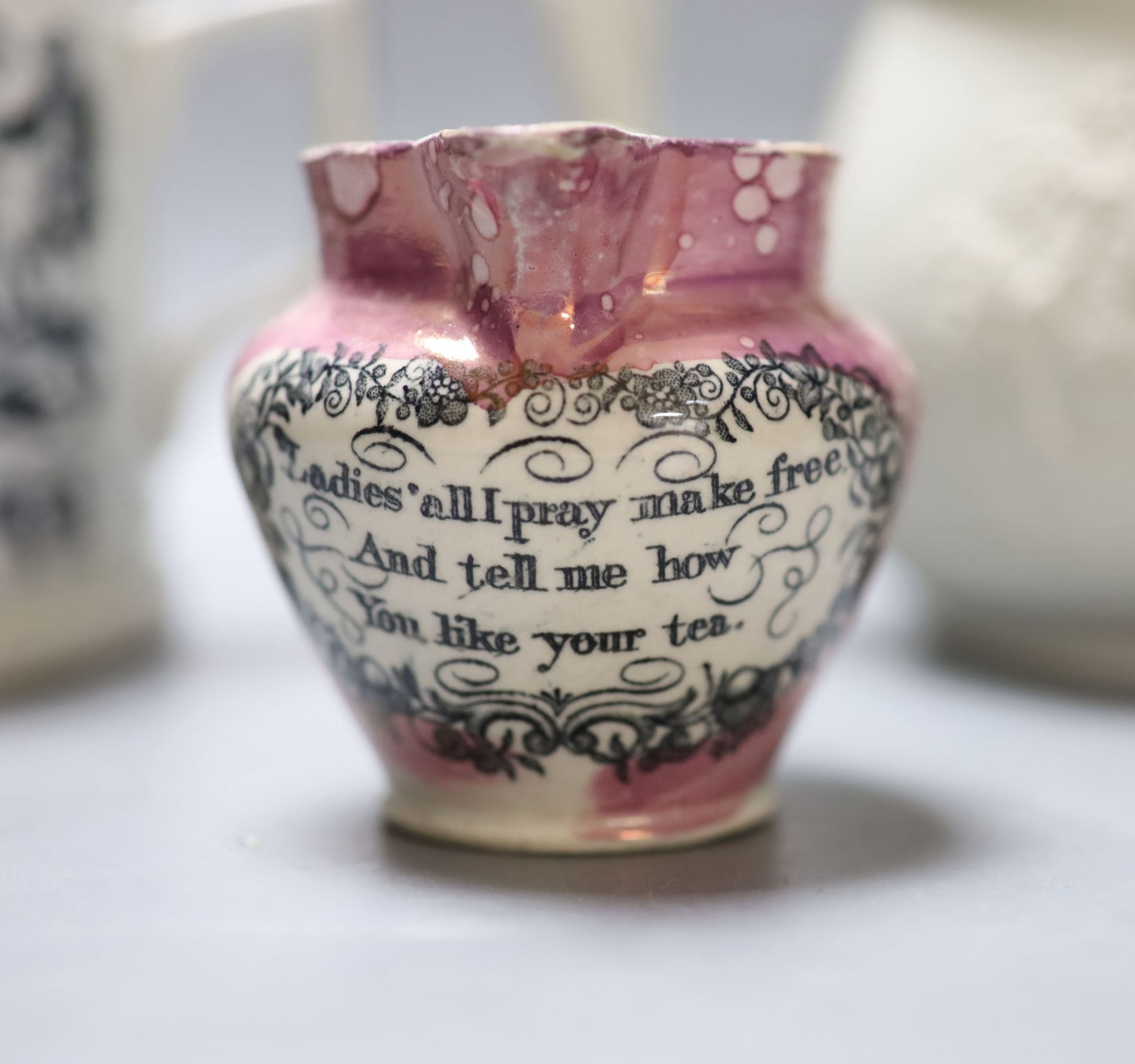 A quantity of mixed Victorian ceramics including a Sunderland lustre plaque, a jug, a two handled mug, a stoneware jug and a pair of le